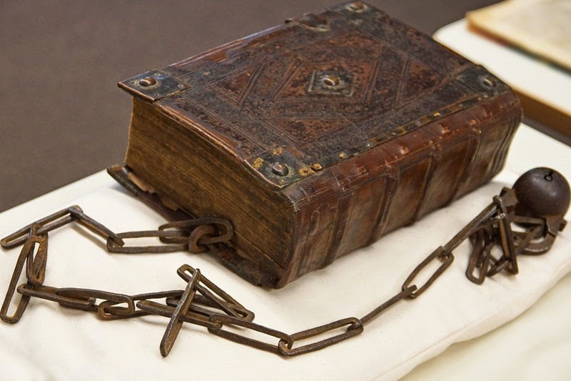 A chained medieval book with a loose chain